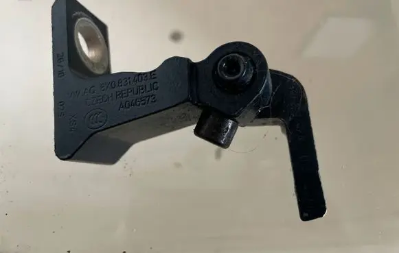Rear door upper hinge