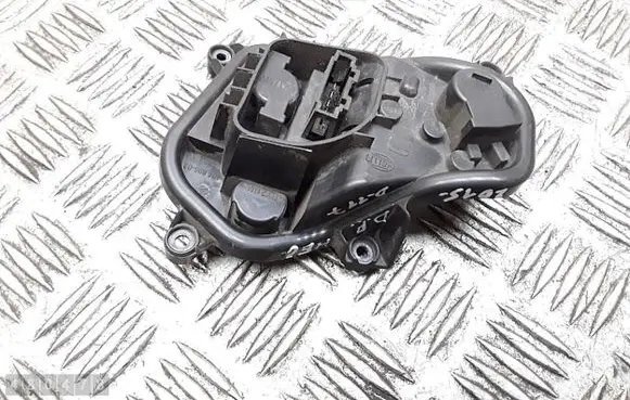 Tail light bulb cover holder