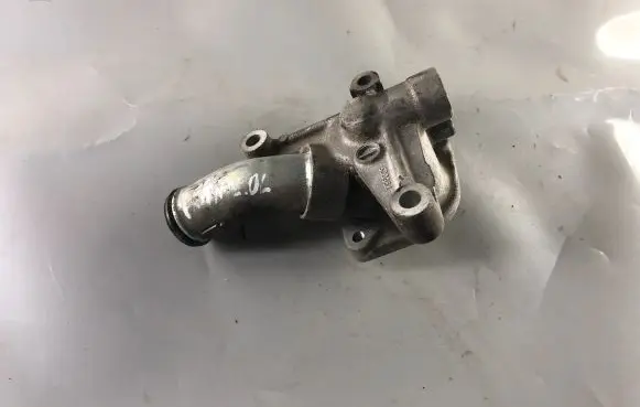 Thermostat/thermostat housing