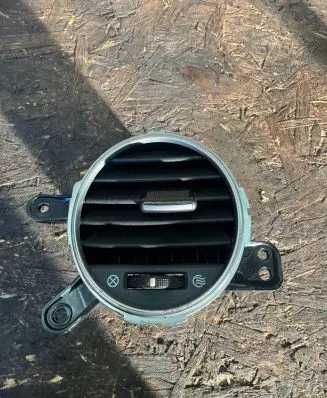 KIA Carens II Dash center air vent grill 974401D000 80462148