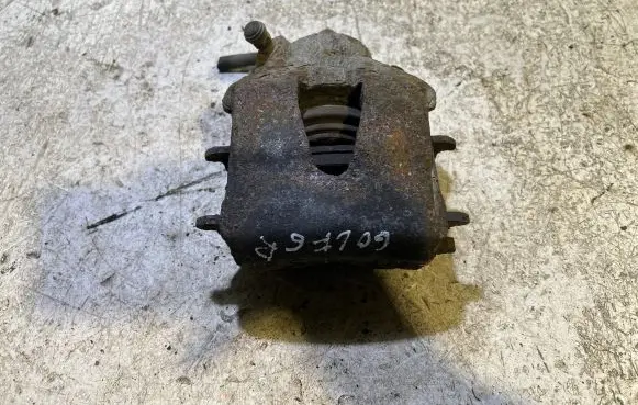 Volkswagen Golf VI Front brake caliper
