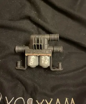 Coolant heater control valve
