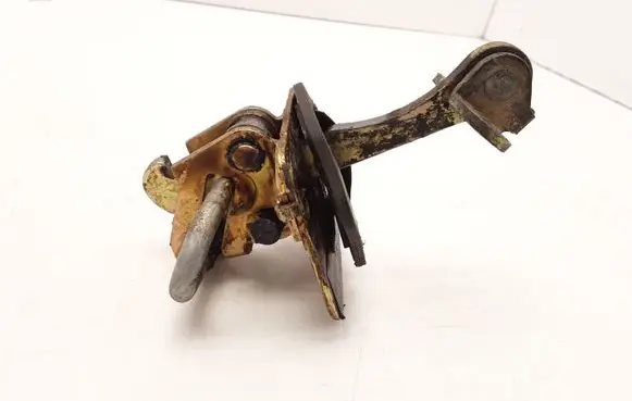 Front door check strap stopper