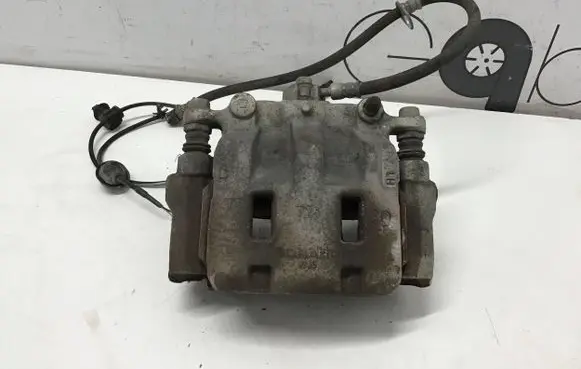 Subaru Outback (BT) Front brake caliper