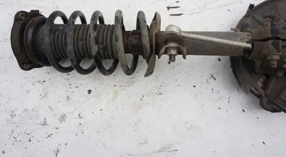 Renault Megane III Front shock absorber with coil spring MCPERSON