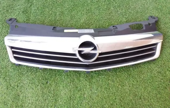 Opel Astra H Front bumper upper radiator grill 13225780 461088395