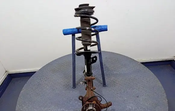 Renault Koleos I Front shock absorber/damper 314043