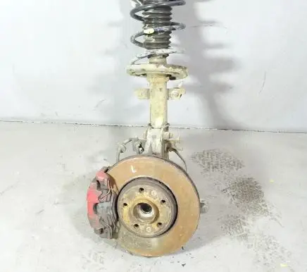 Front shock absorber with coil spring