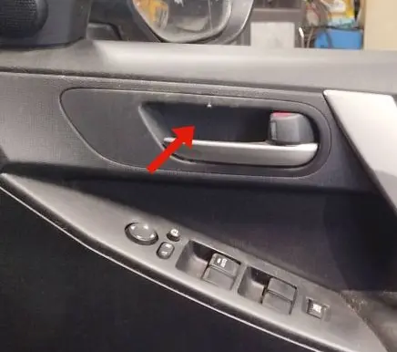 Mazda 3 II Front door interior handle 