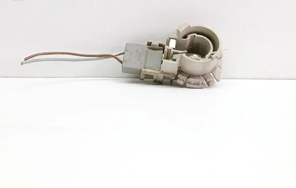 Tail light bulb cover holder