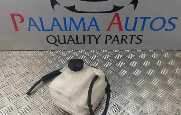 KIA Carens III Coolant expansion tank/reservoir 254303W000