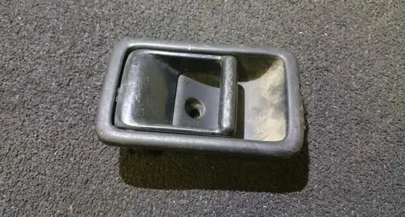 Mazda 323 Rear door interior handle