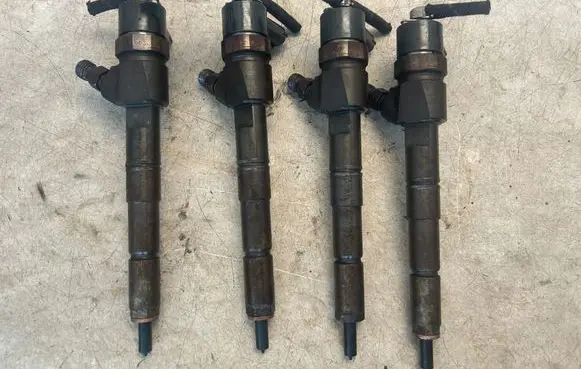 Opel Astra J Fuel injectors set 0445110327