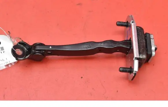 Front door check strap stopper