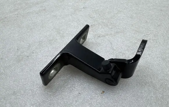 Rear door upper hinge