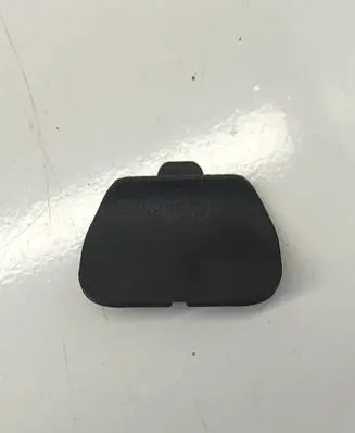 Front driver seat rail trim