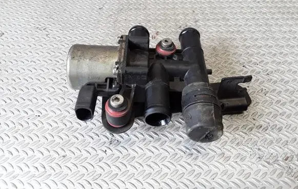 Coolant heater control valve