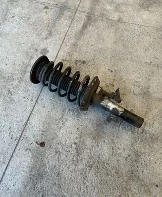 Front shock absorber with coil spring