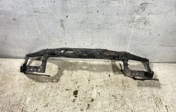 Top upper radiator support slam panel