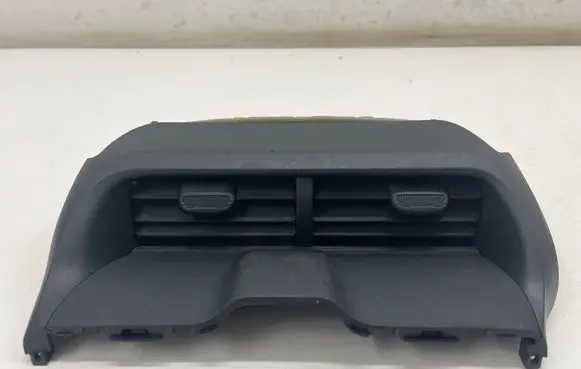 Toyota Yaris XP210 Dash center air vent grill 55670K0050 M0U022896
