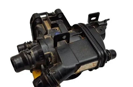 Thermostat/thermostat housing