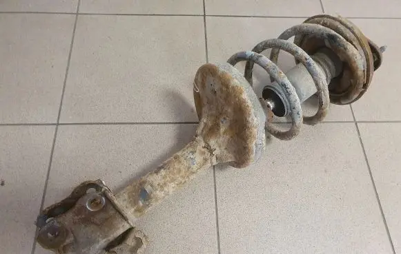 Mitsubishi Outlander Front shock absorber with coil spring