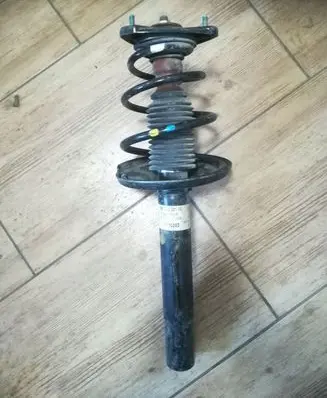 Porsche Cayman 987 Front shock absorber with coil spring 98734304107