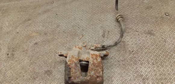 Opel Corsa D Front brake caliper 