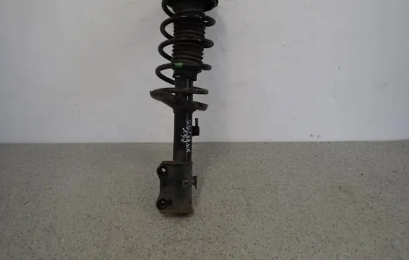 Suzuki Grand Vitara II Front shock absorber with coil spring