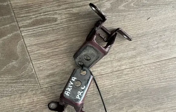 Nissan Ariya Front door upper hinge 6RLL