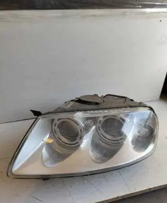 Volkswagen Touareg I Headlight/headlamp 7L6941015CF 89307851