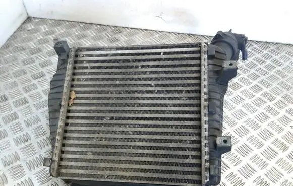Volkswagen Touareg I Intercooler radiator 7L0145803A