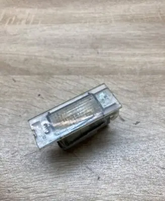 Renault Megane II Number plate light 7700796163