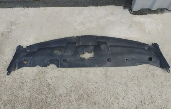Engine bonnet/hood lock trim molding