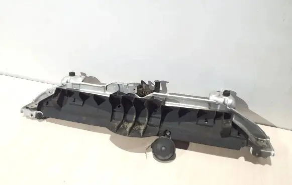 Top upper radiator support slam panel