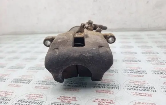 Volkswagen PASSAT B7 Rear brake caliper 