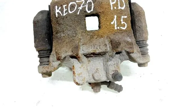 Nissan Juke I F15 Front brake caliper