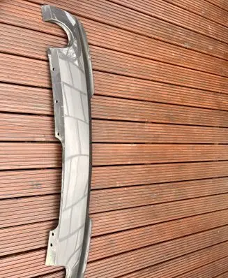 Rear bumper trim bar molding