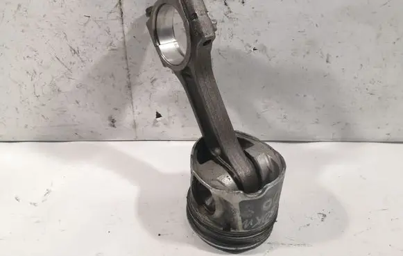 Piston with connecting rod