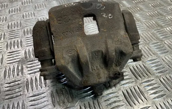 Hyundai Tucson JM Front brake caliper
