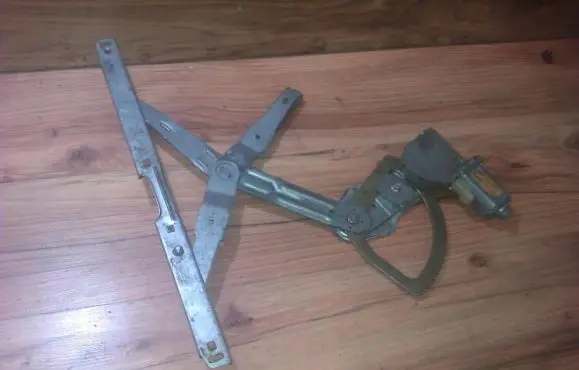 Sliding door window regulator with motor