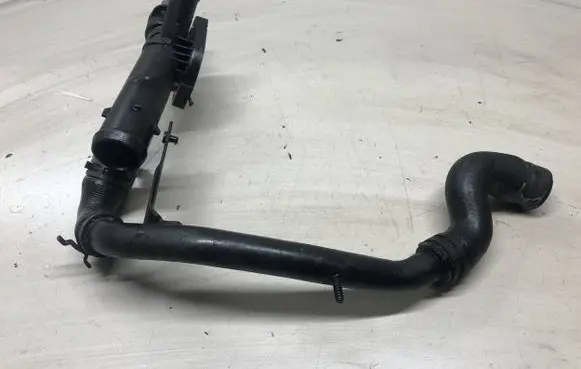 Volkswagen PASSAT B7 Engine coolant pipe/hose 03L121131AA