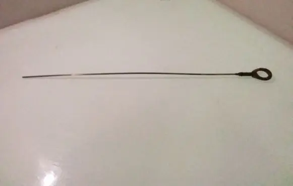 Oil level dip stick
