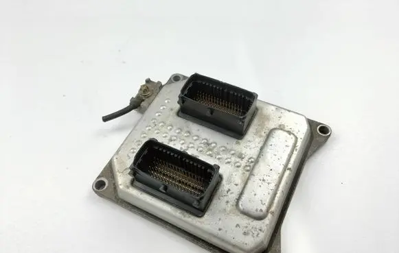 Opel Zafira B Engine control unit/module 55571557