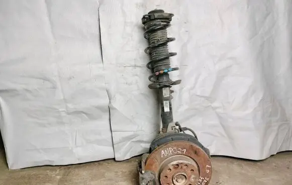 Front wheel hub spindle knuckle
