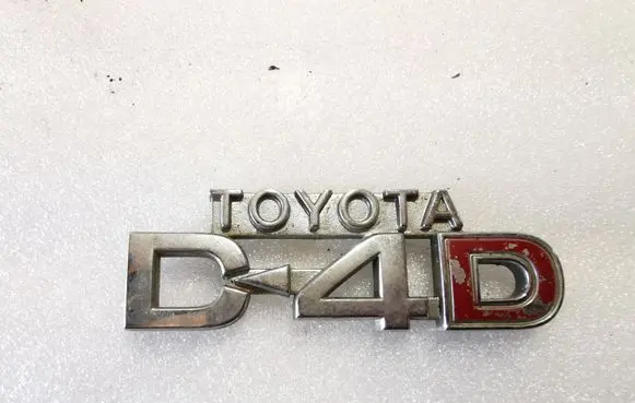 Toyota Corolla E120 E130 Manufacturers badge/model letters 