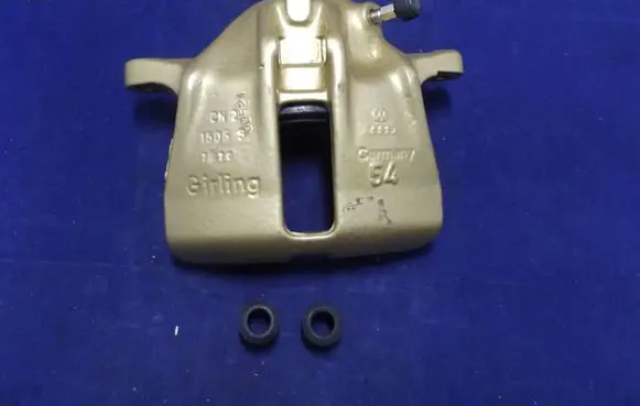 Volkswagen Golf III Front brake caliper 50994 357615123A UBD