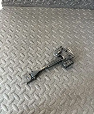 Audi Q3 F3 Front door check strap stopper 83A837249