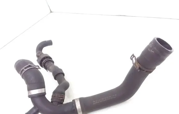 Volkswagen PASSAT B7 Engine coolant pipe/hose 3AA122101E 1K0121087AF