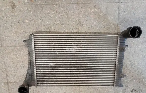 Volkswagen Touran I Intercooler radiator 1k0145803r